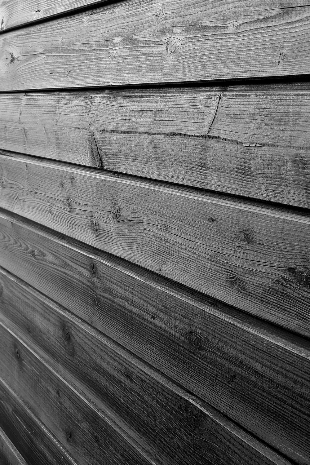 Détails des planches noires de palissades